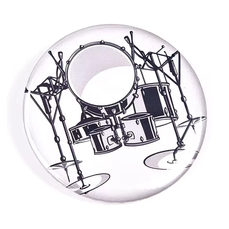 Round white badge with a black drum-kit illustration.