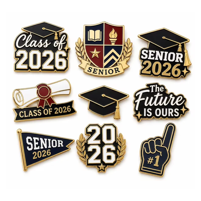 A set of black and gold Class of 2026 graduation, senior and school-crest pins.