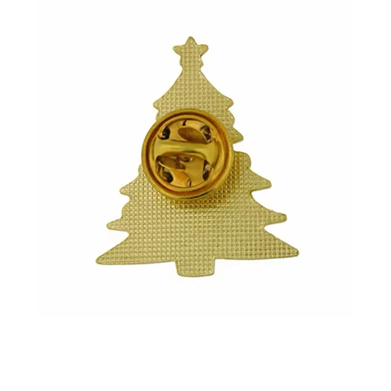 Textured gold-colored back of a Christmas tree pin with an attached round butterfly clutch.
