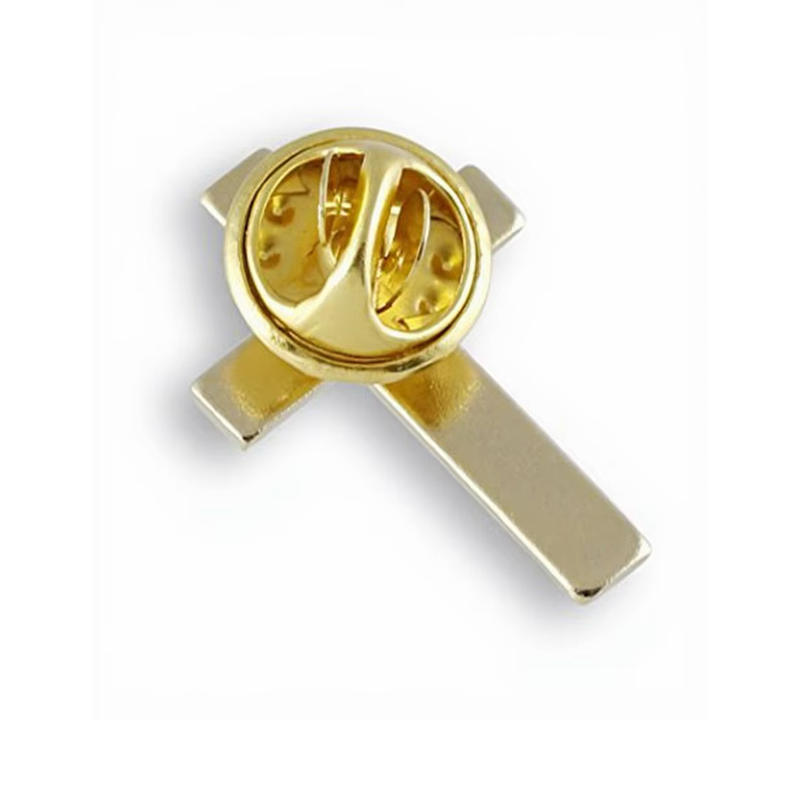 Back of a gold-colored cross pin with an attached round butterfly clutch.