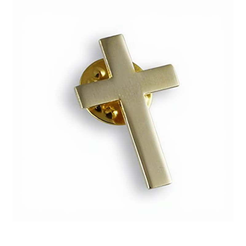 Plain gold-colored cross pin shown from the front with a round clutch behind it.