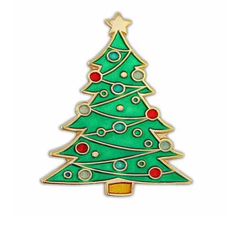 Green Christmas tree pin with a gold-colored star, garlands and red and pale green ornaments.