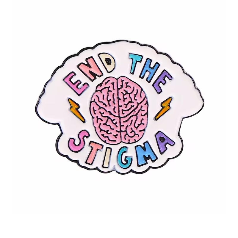 White scalloped pin with a pink brain, yellow lightning bolts and multicolored End the Stigma lettering.