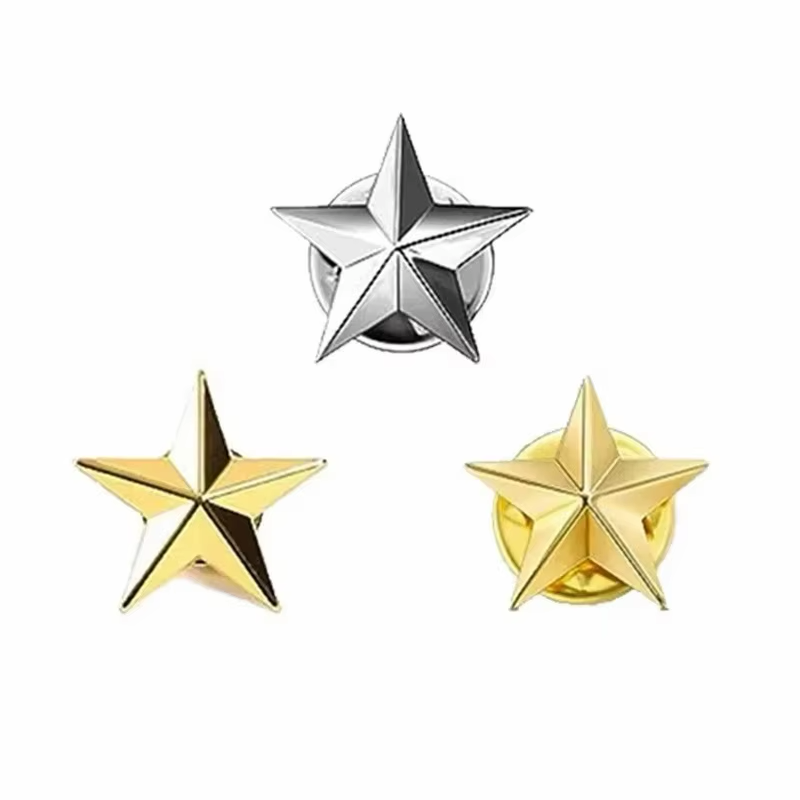 Three faceted five-pointed star pins in silver-tone and gold-tone finishes, with angular raised faces on a white background.