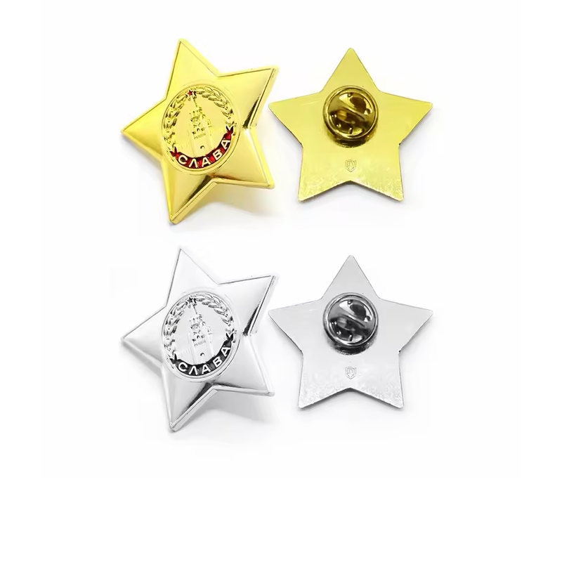 Gold-tone and silver-tone five-pointed star pins with circular wreath and tower emblems and Cyrillic lettering, shown front and back with butterfly clutches on white.