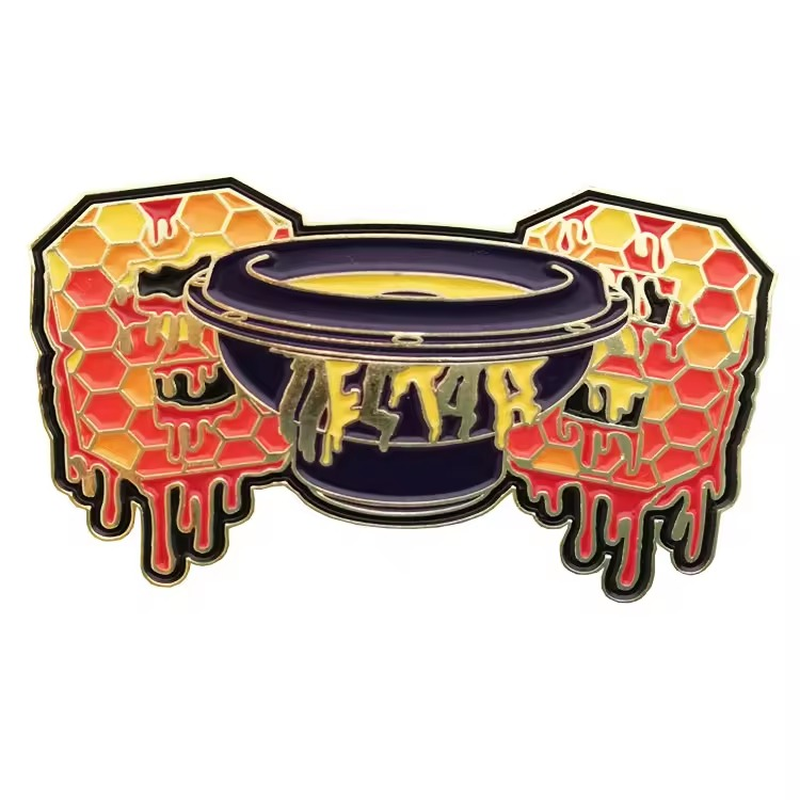Dark purple bowl pin with yellow drips and orange-and-yellow honeycomb side panels.