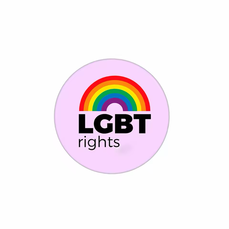 Round pale pink button badge with a rainbow above the black words LGBT rights on a white background.