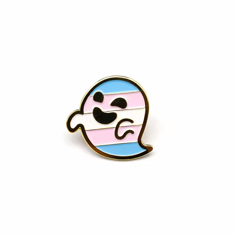 Smiling ghost pin with blue, pink and white horizontal stripes and a gold-colored outline.
