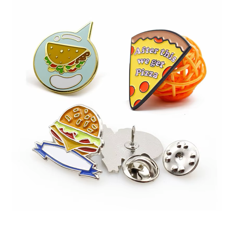 Taco, pizza slice and burger pins shown with a silver-tone pin back and butterfly clutches; the pizza reads After this we get Pizza.