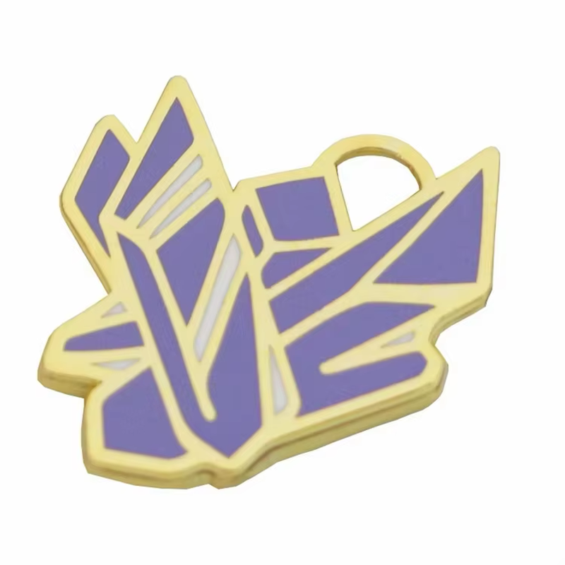 Purple geometric robot-face emblem with gold-colored outlines and a small top loop.