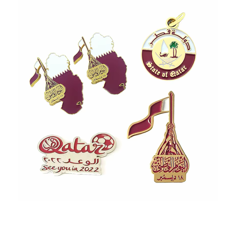 Five Qatar-themed designs featuring map outlines, a round emblem, football lettering and a hand holding the maroon-and-white flag.