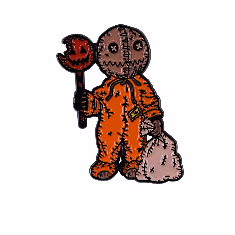 Orange-suited Halloween character pin with a stitched sack head, pumpkin lollipop and bag.