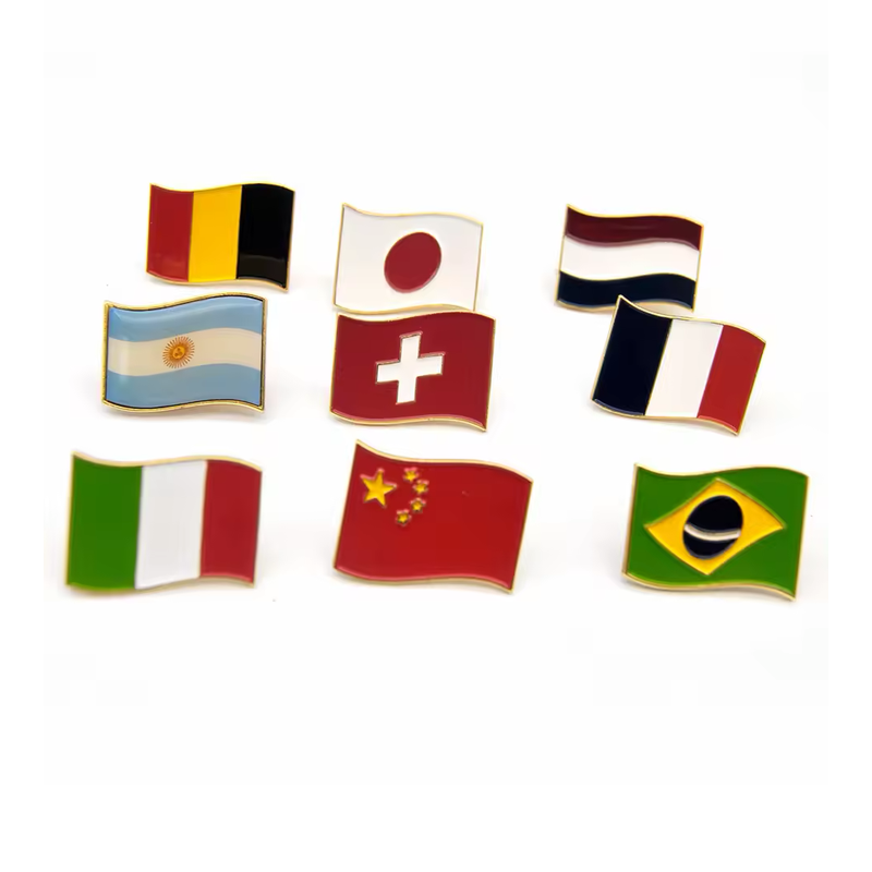 Nine wavy flag-shaped pins with gold-colored edges, including Japanese, Swiss, French, Chinese and Brazilian designs.