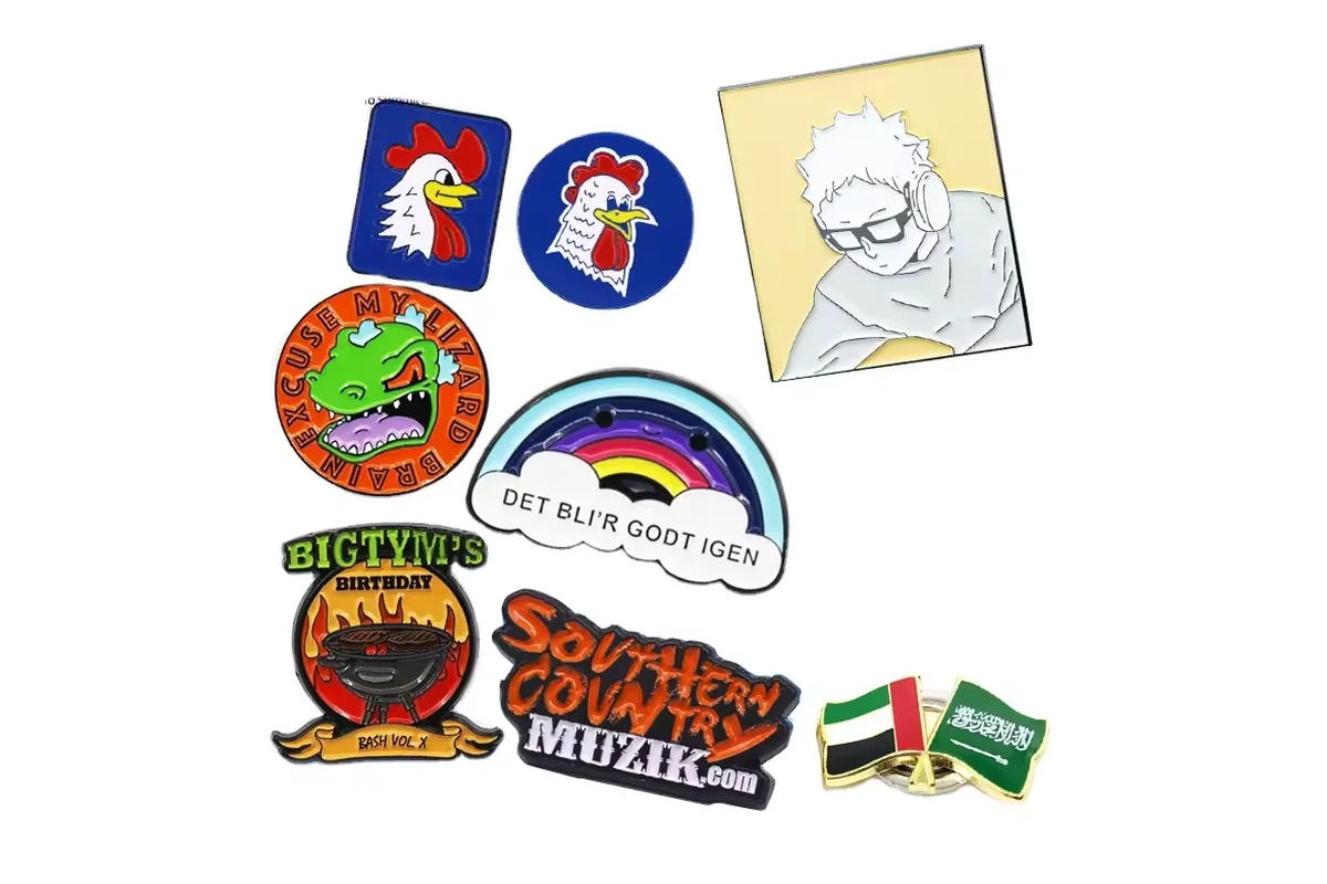 A selection of colorful logo and artwork pins.