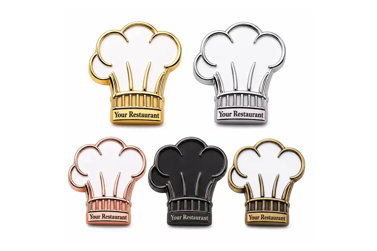 Chef hat pins in several metal colors.